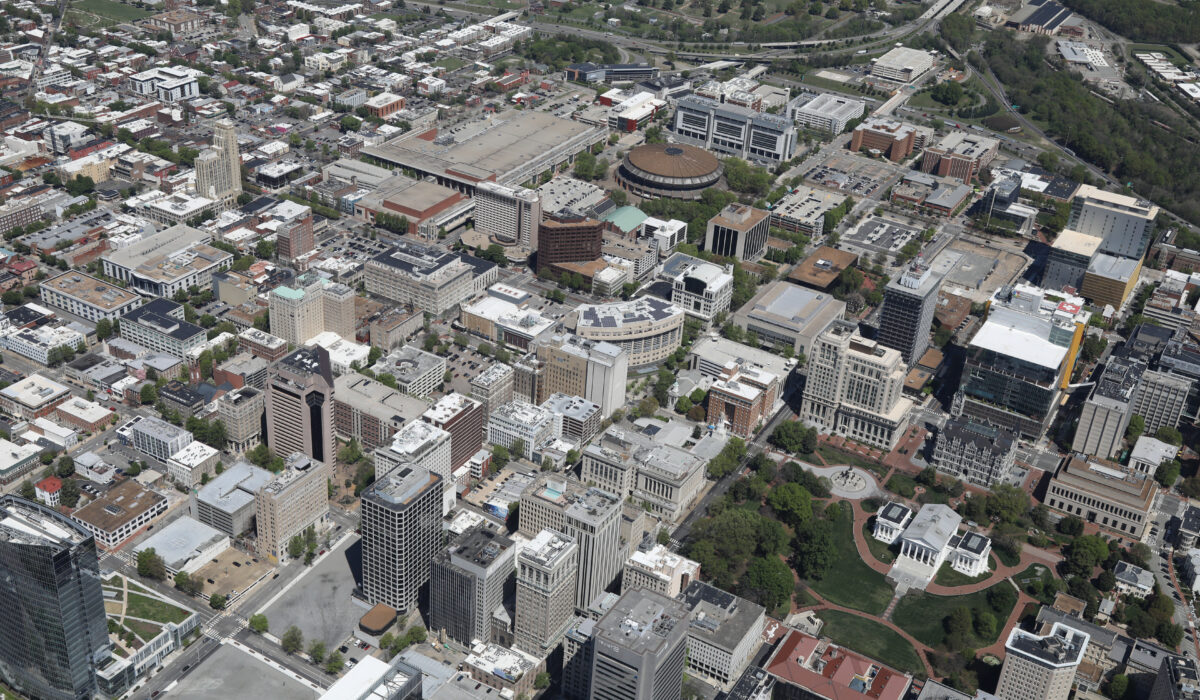 Aerial view of downtown offices, parks, streets, and homes.